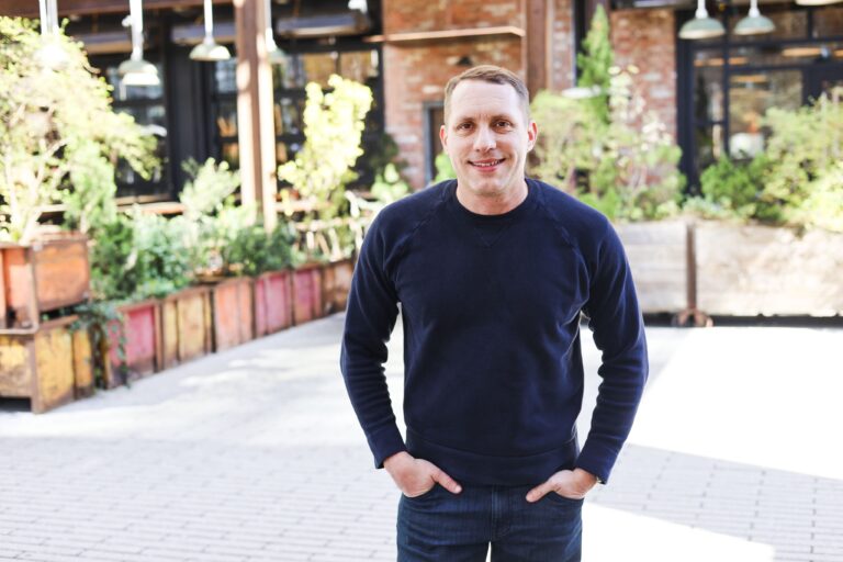 Brandon Yopp, Raleigh NC REALTOR® with The Oceanaire Realty, pictured in Raleigh, North Carolina after appearing on the Coach & Friends podcast to discuss the 2026 Raleigh-Durham-Chapel Hill real estate market, buyer pre-approval strategies, home selling advice, and North Carolina housing trends.