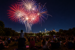 Fireworks bursting over a nighttime skyline near Raleigh NC during the July 4th 2026 celebration at Dix Park